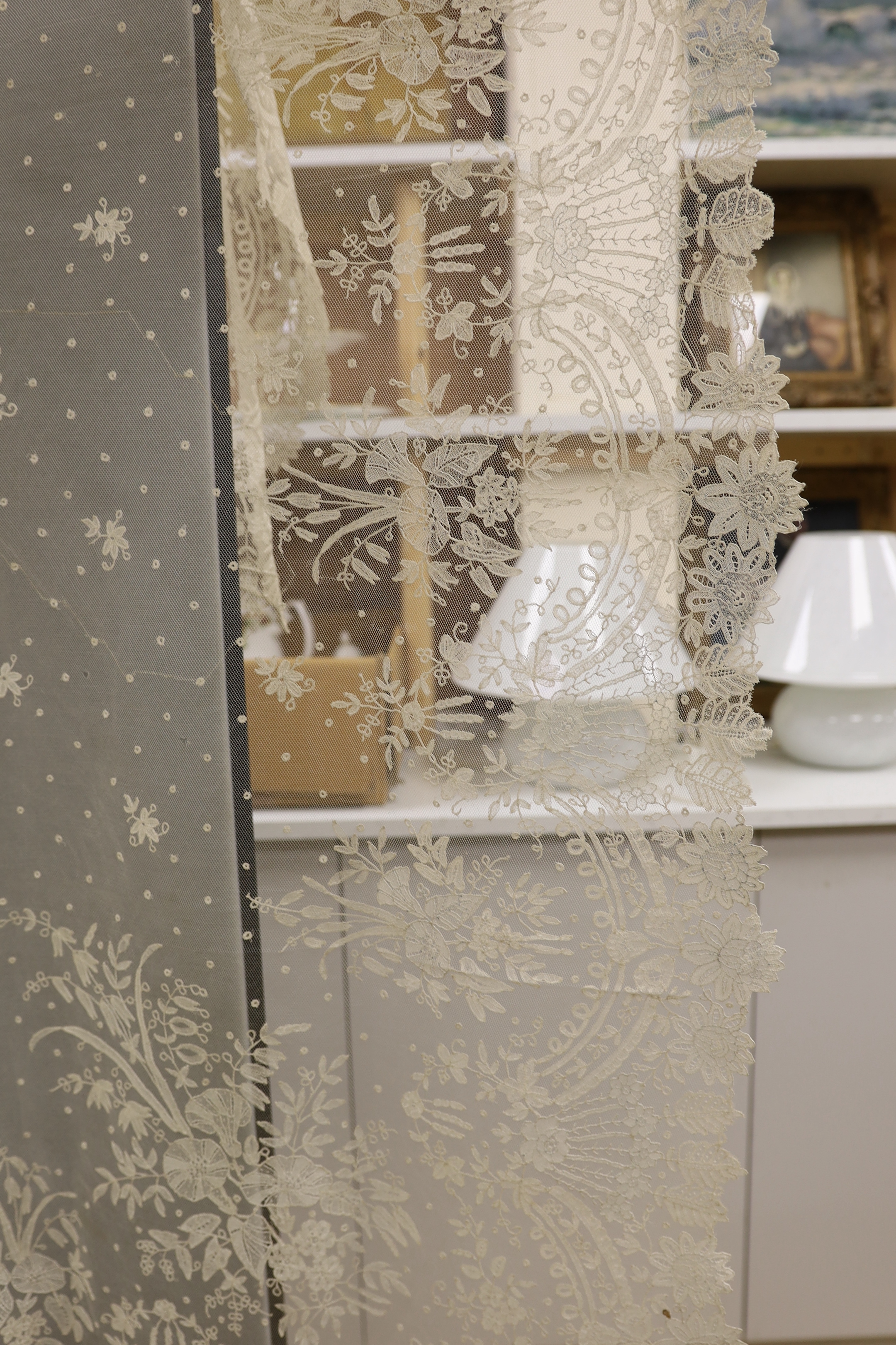 A 19th century Brussels bobbin lace wedding veil with point de gaze needle lace border and insertions, 196cm x 192cm